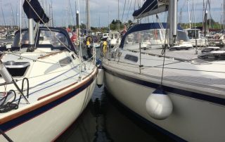 Boats moored in Titchmarsh Marina on the Walton cruise