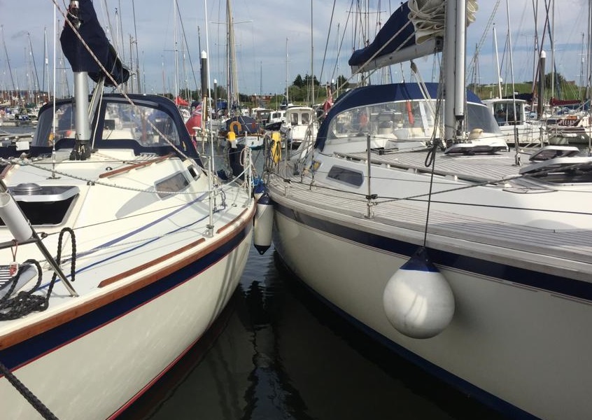 Boats moored in Titchmarsh Marina on the Walton cruise